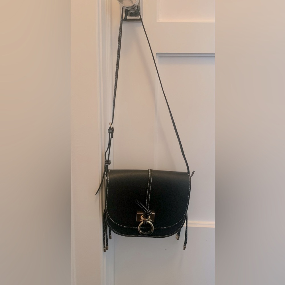Zara women’s black crossbody handbag with
white stitching